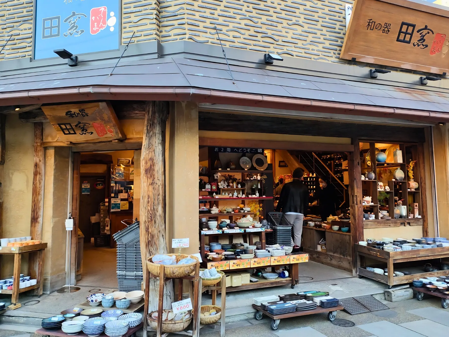 Bargain ceramics piled up outside Dengama