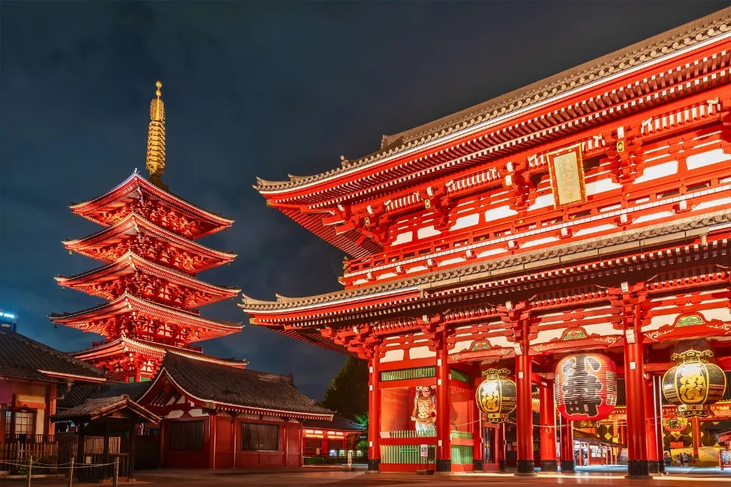 The lit-up Hozomon gate and five-story pagoda of Senso-ji at night