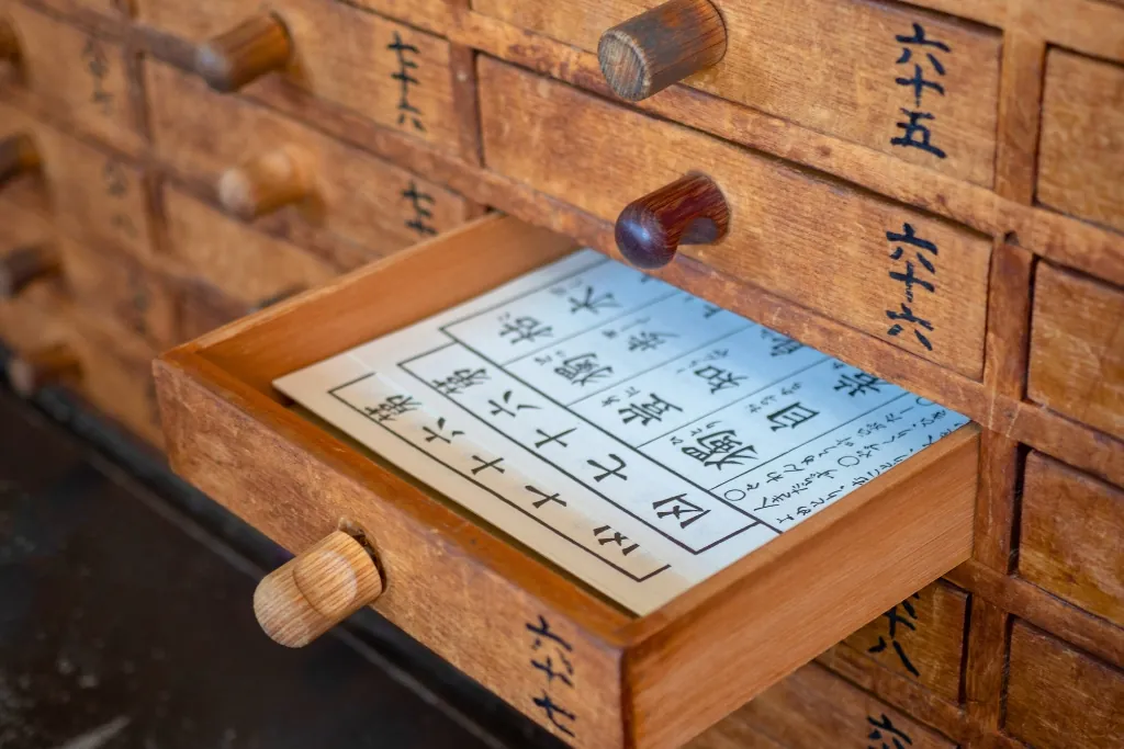 Wooden drawers of omikuji fortune slips