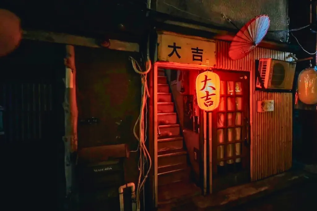 A tiny bar entrance with a red lantern