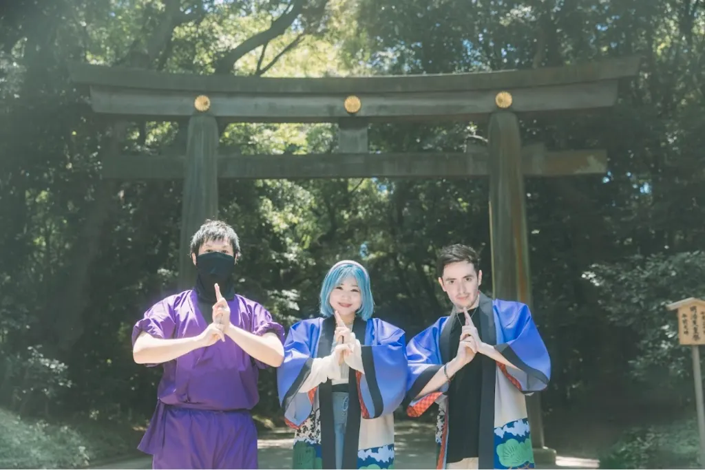Guests with the Ninja guide at a torii gate