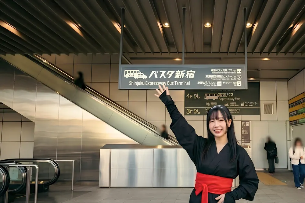 The Ninja guide pointing to the Busta Shinjuku sign