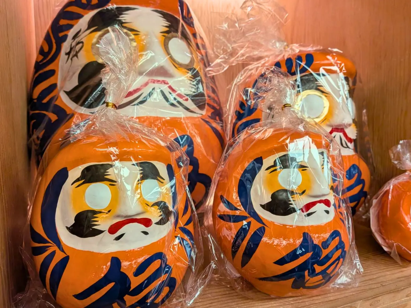 Colorful daruma dolls in a Shinjuku shop