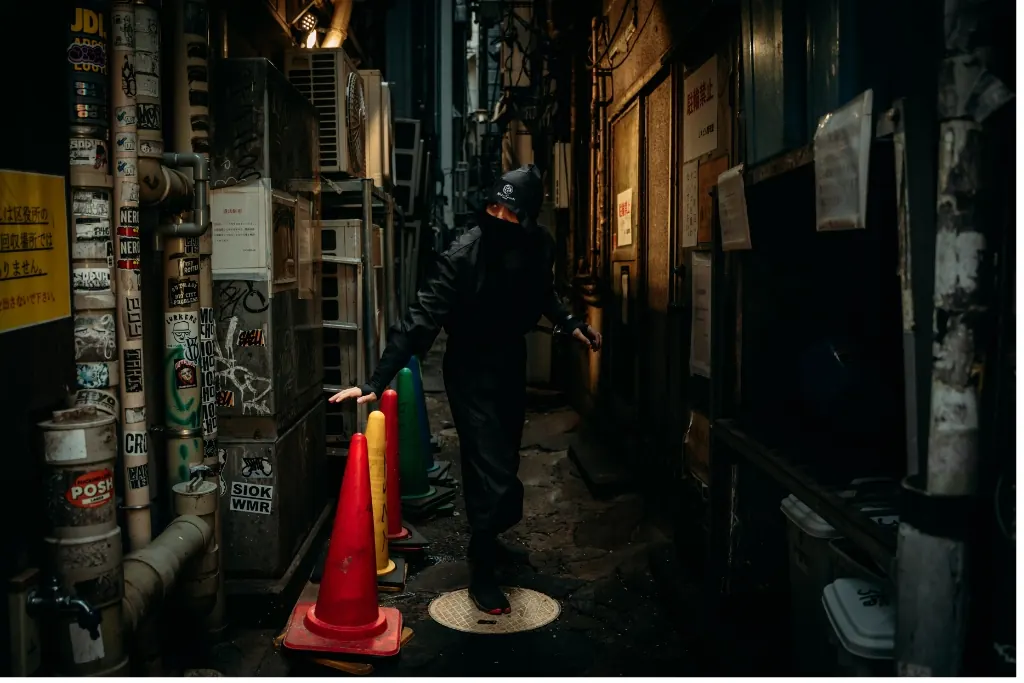 A quiet back alley behind the neon